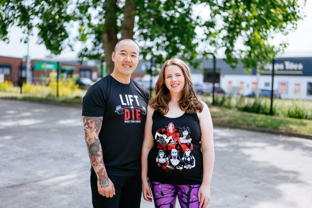 kit and lisa of unwonted apparel model some of their clothing underneath a tree