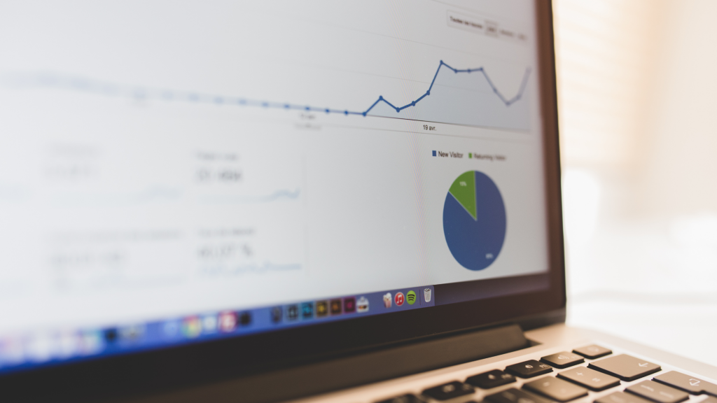 a computer shows an older dashboard of google analytics